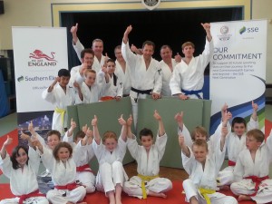 Club members celebrate delivery of new tatami